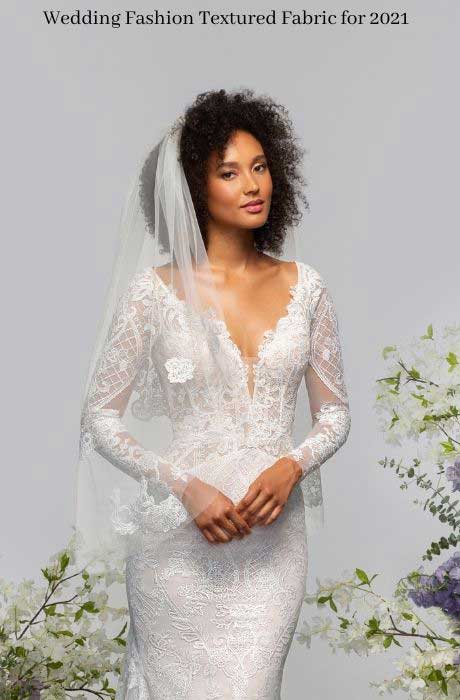 Hayley Paige long-sleeved, fit-to-flare gown with richly-embroidered tulle over a luxurious cashmere