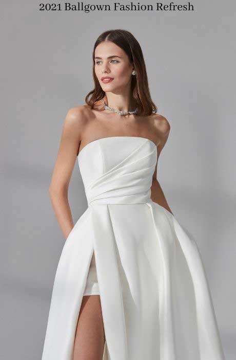 Justin Alexander Signature's strapless ballgown conceals a  miniskirt that peeks out from under a th