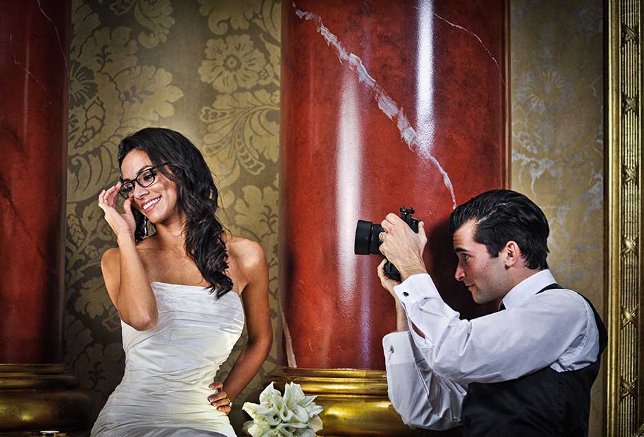 Groom taking picture of bride at The Venetian New Jersey 