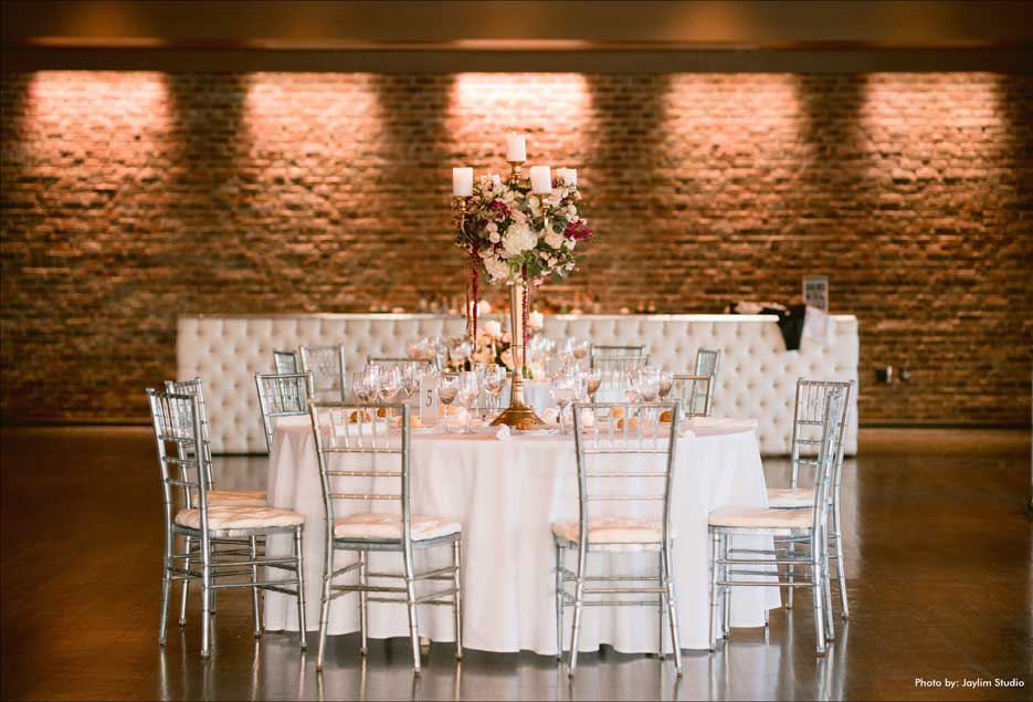 Bride and groom white wedding table at the Village Club at Lake Success. 